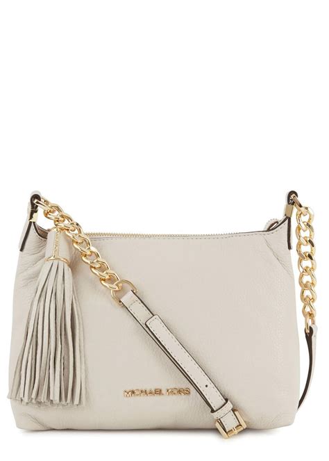 michael kors purse spray|cream michael kors bag.